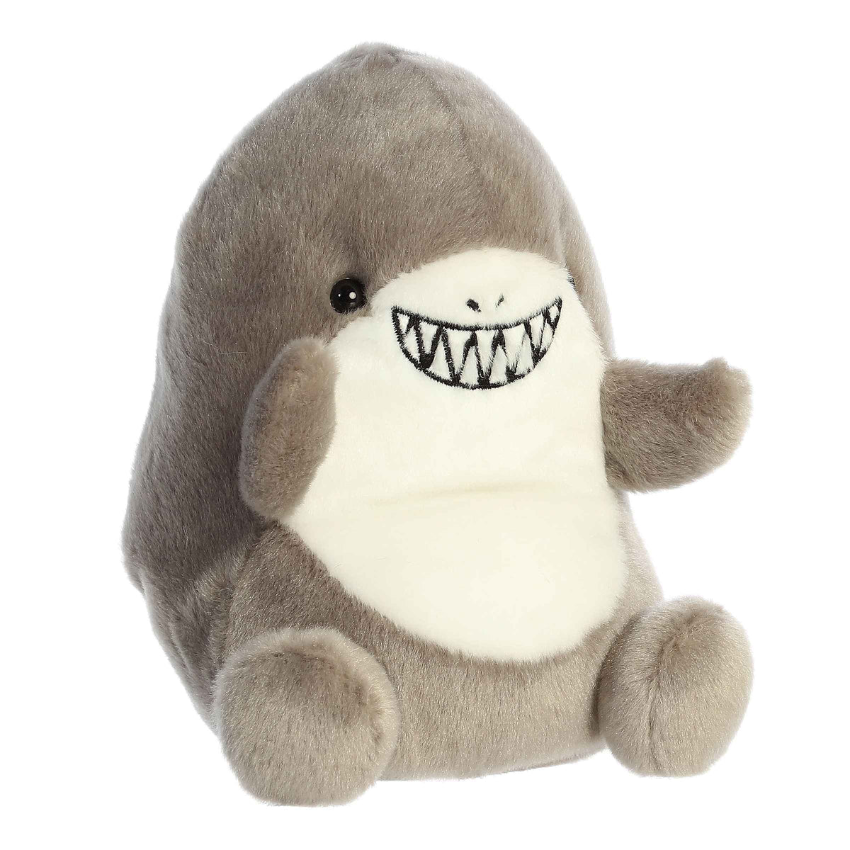 Larger plush toy of a grey shark in the Palm Pals collection, featuring a wide, toothy smile and a soft, huggable body.