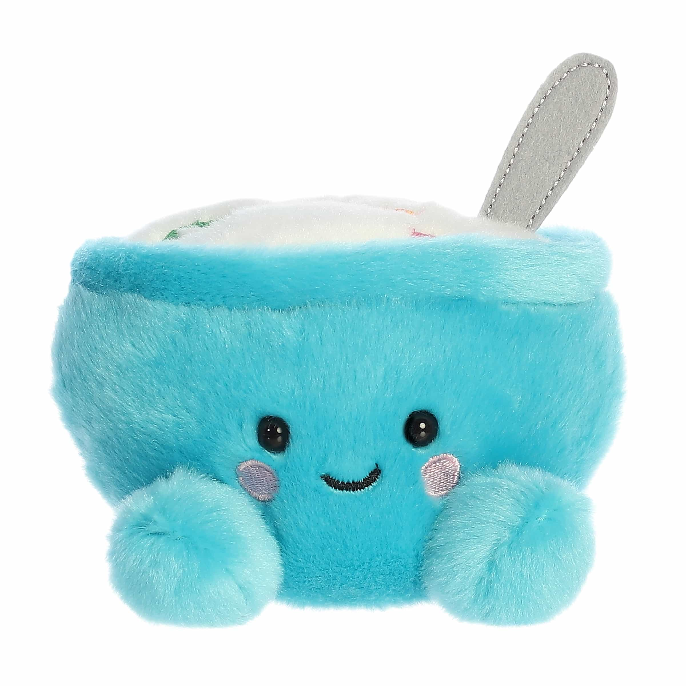 Trixi Cereal plush, turquoise with a cozy cereal bowl design, sweet smile and rosy cheeks.