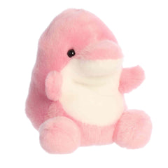 Plush toy of a pink dolphin by Palm Pals with a round white belly, flippers, and a sweet smiling face.