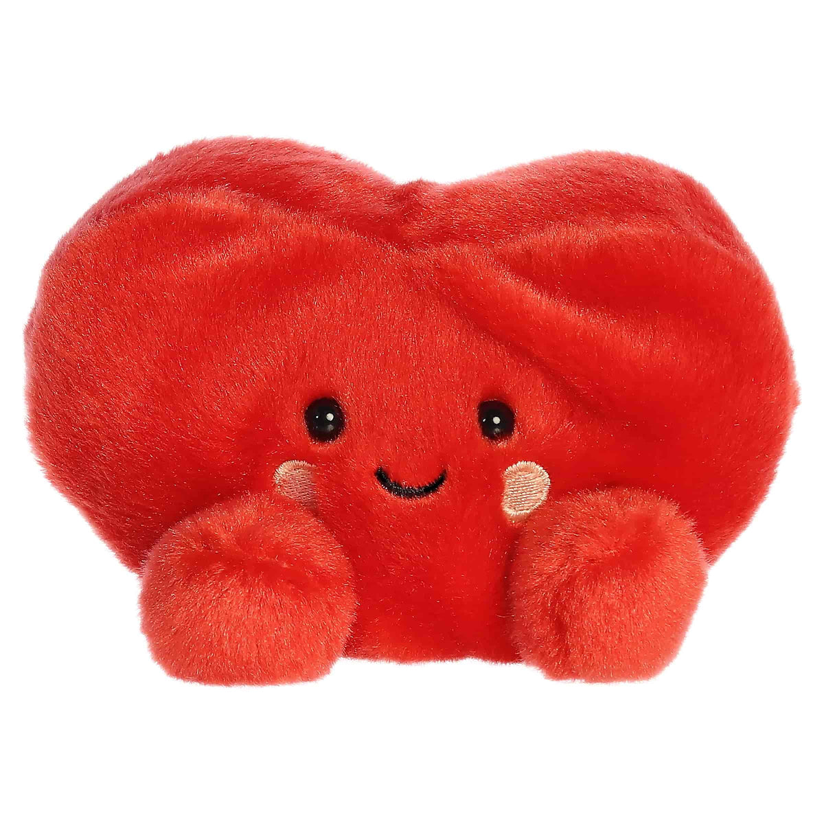 A small red heart plush with rosy cheeks and a sweet smile from Palm Pals by Aurora.