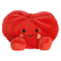 A small red heart plush with rosy cheeks and a sweet smile from Palm Pals by Aurora.