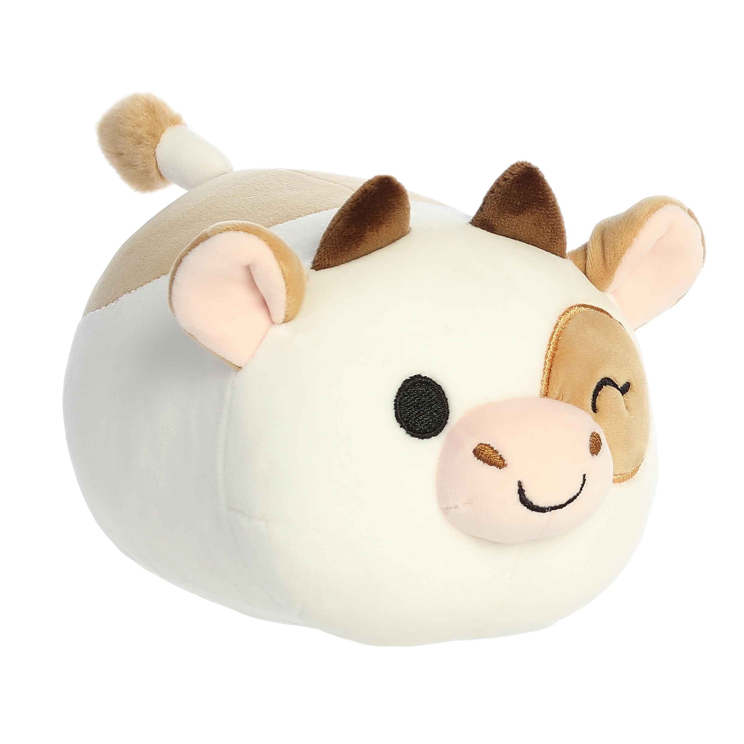 Charlie Chocolate Milk plush from Mooples, featuring a bean-shaped cow in white and brown