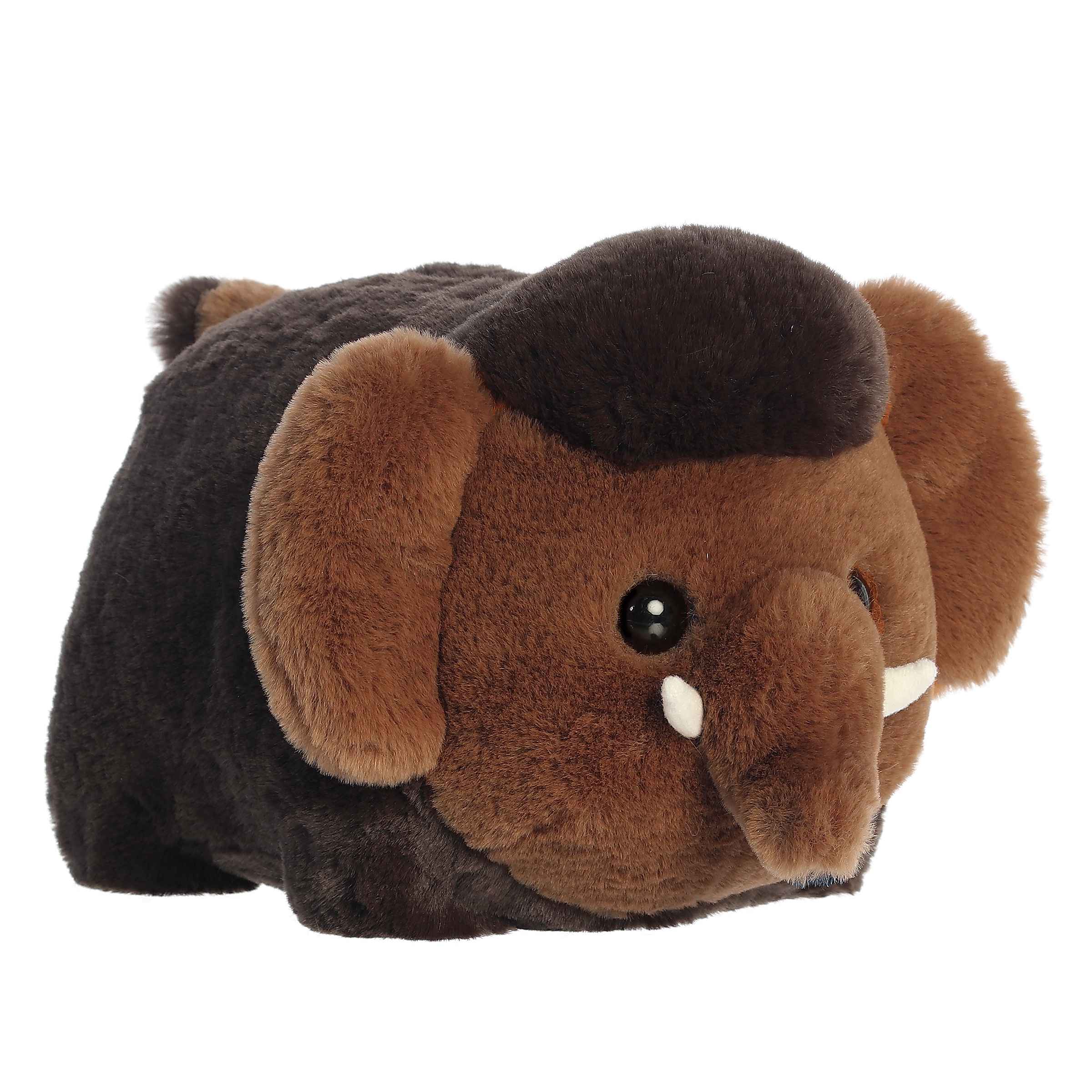 Plush toy of a potato-shaped Wooly Mammoth in the Spudsters collection with fluffy brown fur and tusks