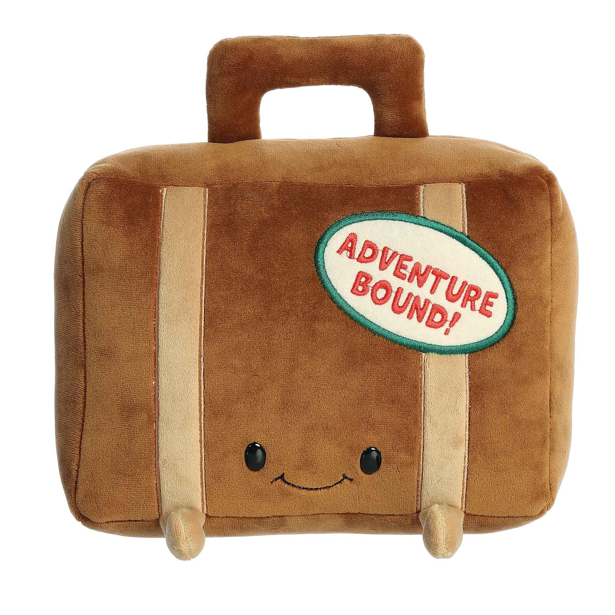 Plush toy shaped like a suitcase from the Just Sayin' collection with an "Adventure Bound" patch and soft brown fabric.