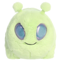 An alien plush toy from Aurora with a rounded potato shape, green fur, and playful cosmic details.
