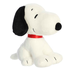 9-inch Seated Snoopy plush by Peanuts and Aurora, with signature black ears and red collar