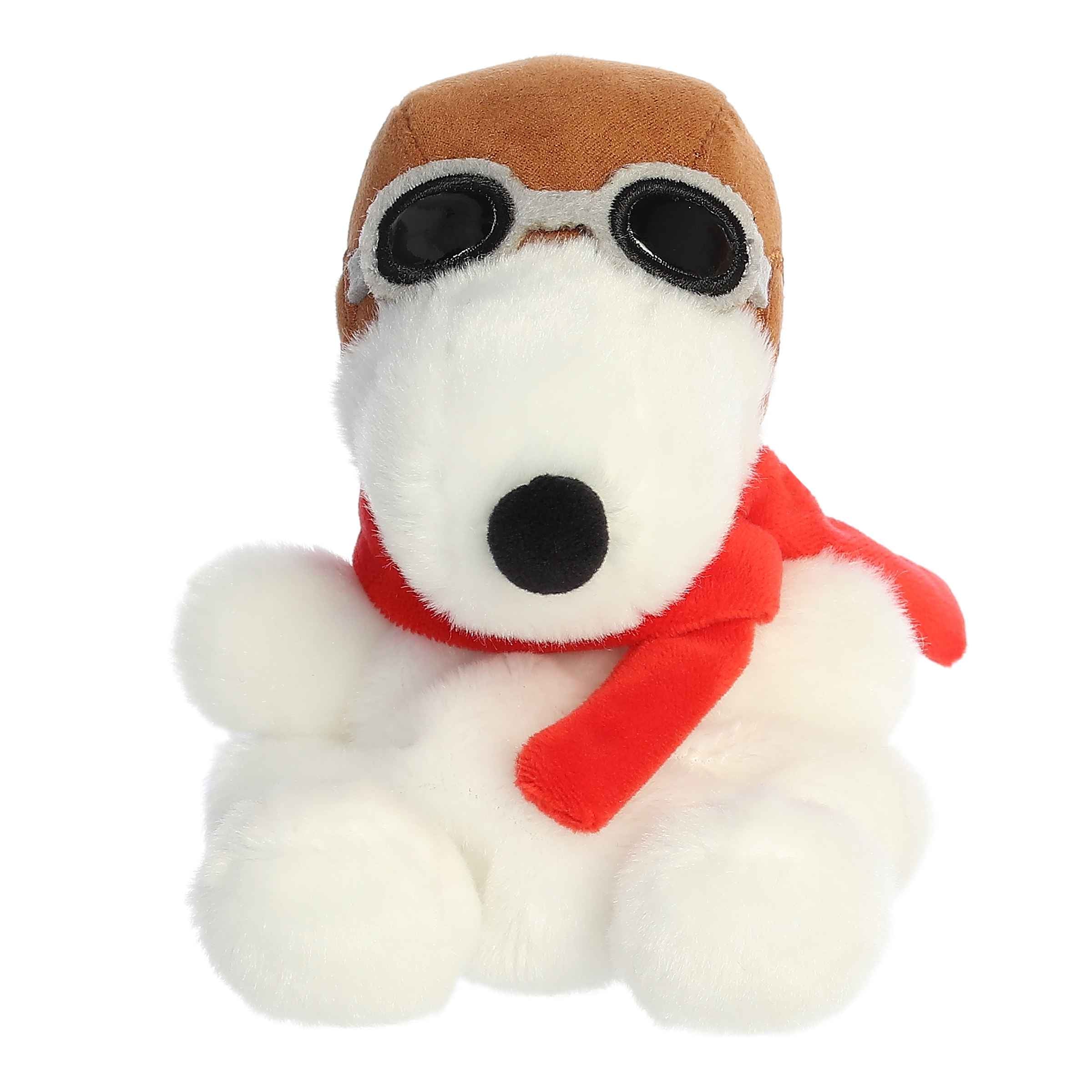 Flying Ace Snoopy Palm Pals plush from the Peanuts collection with cap, goggles, and red scarf, ready for adventure