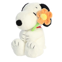 Snoopy with Flower plush from Peanuts Collection by Aurora, featuring Snoopy holding a yellow flower