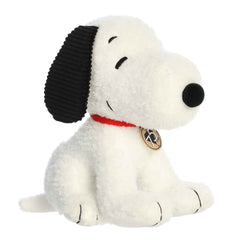 Limited edition Snoopy plush from the Peanuts collection with a red collar and a special hang tag