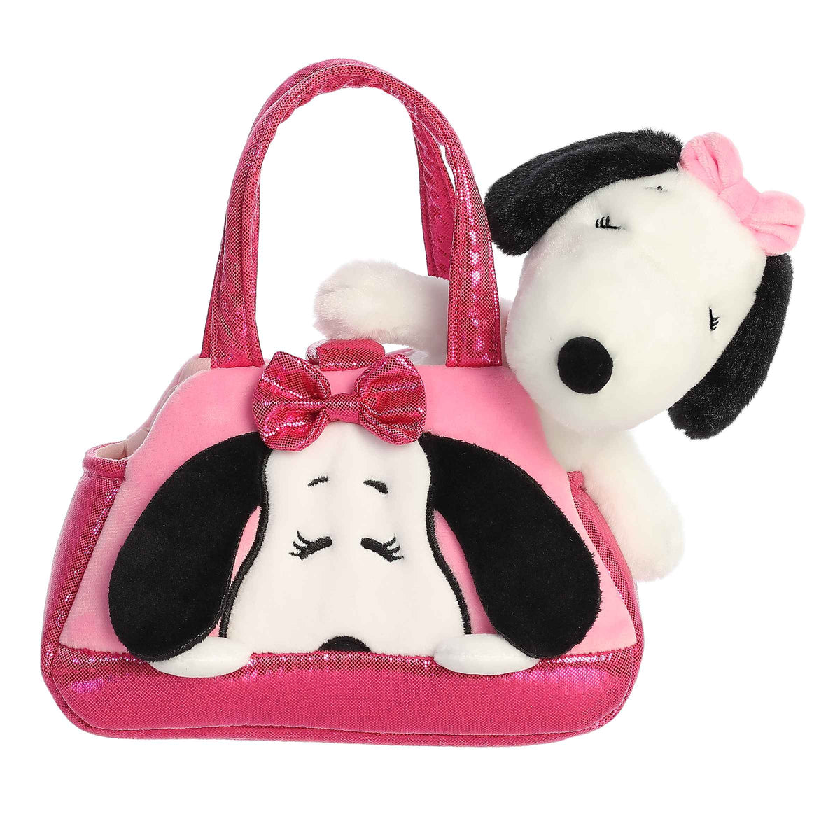 Plush Belle from the Peanuts collection inside a pink carrier with a matching bow.