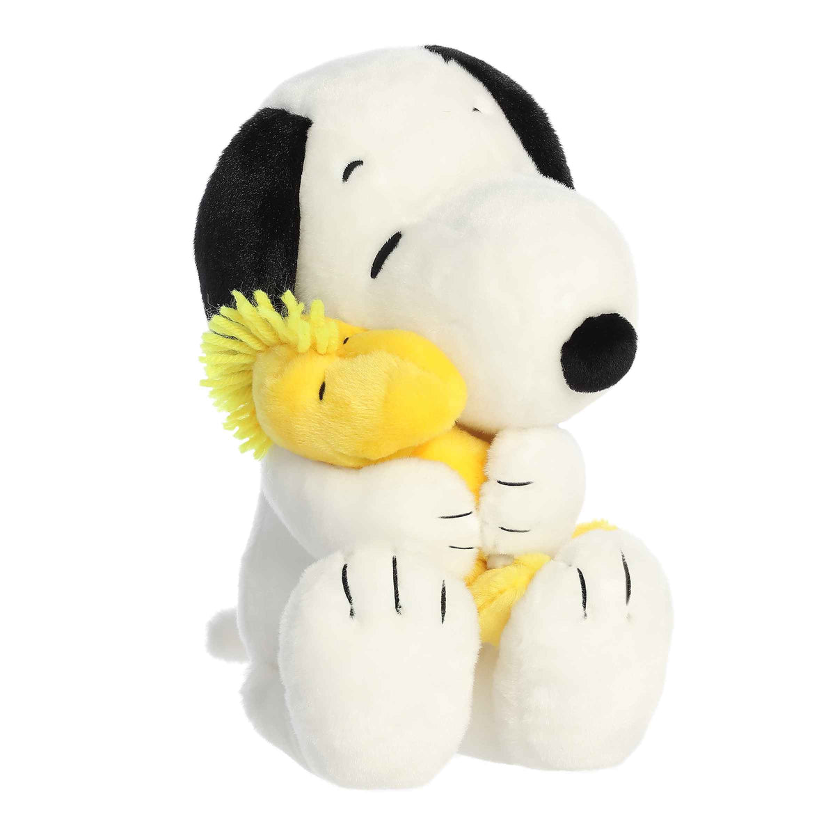 Plush of Snoopy hugging Woodstock from the Peanuts collection, showcasing their heartwarming friendship.