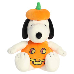 Snoopy plush wearing a bright orange pumpkin costume