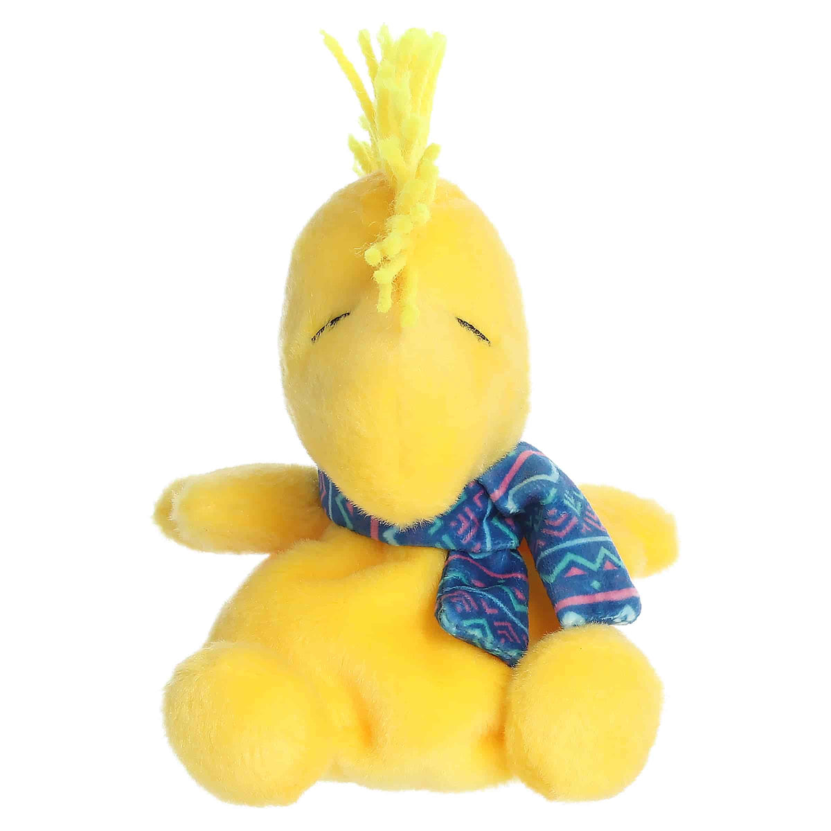 Yellow Woodstock plush with cozy winter snow-themed details