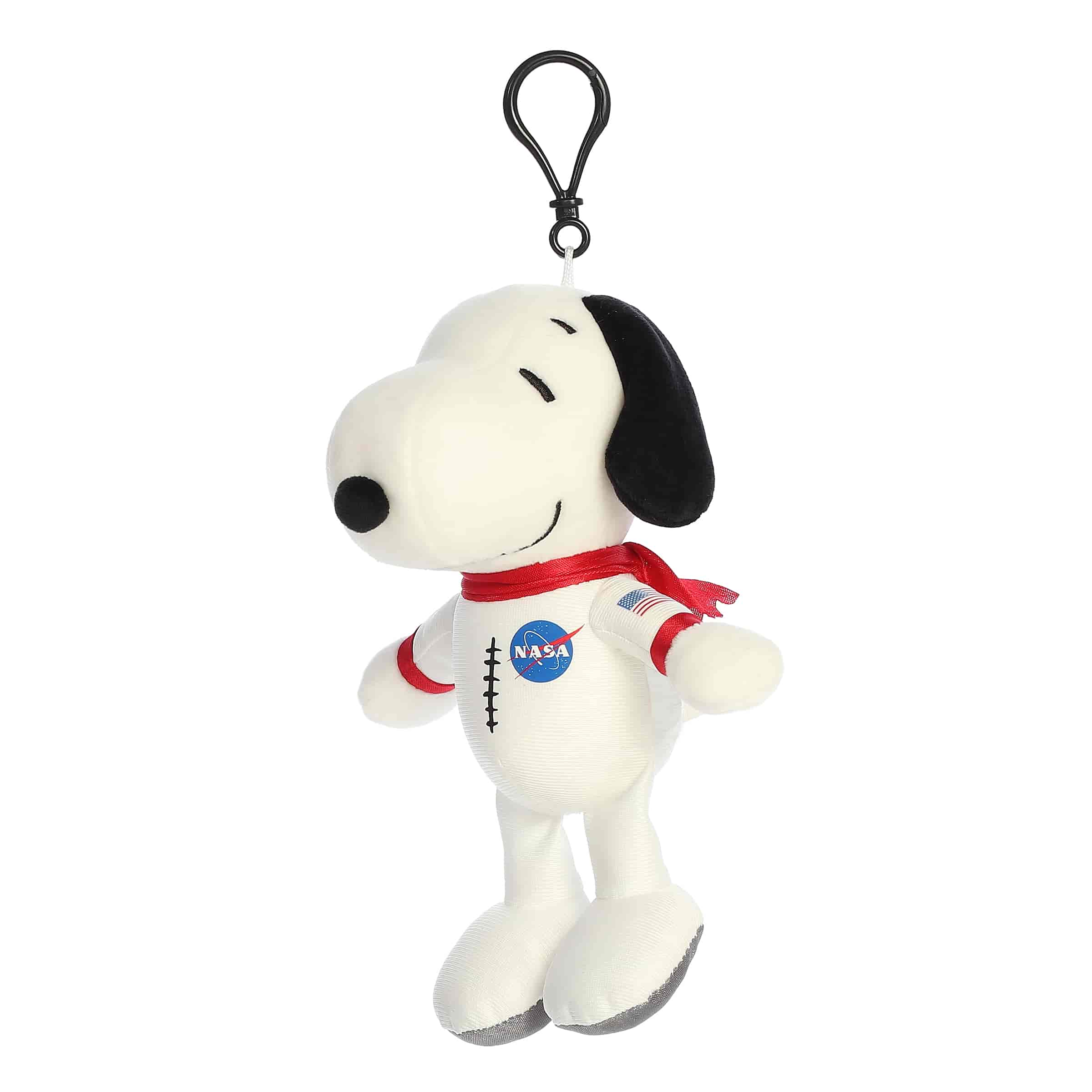 A Snoopy keychain plush wearing a white astronaut suit with NASA logos from the Peanuts collection by Aurora.