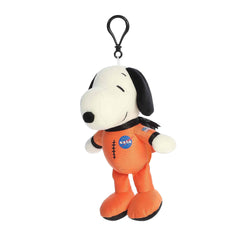 A Snoopy keychain plush wearing an orange astronaut suit with NASA details from the Peanuts collection