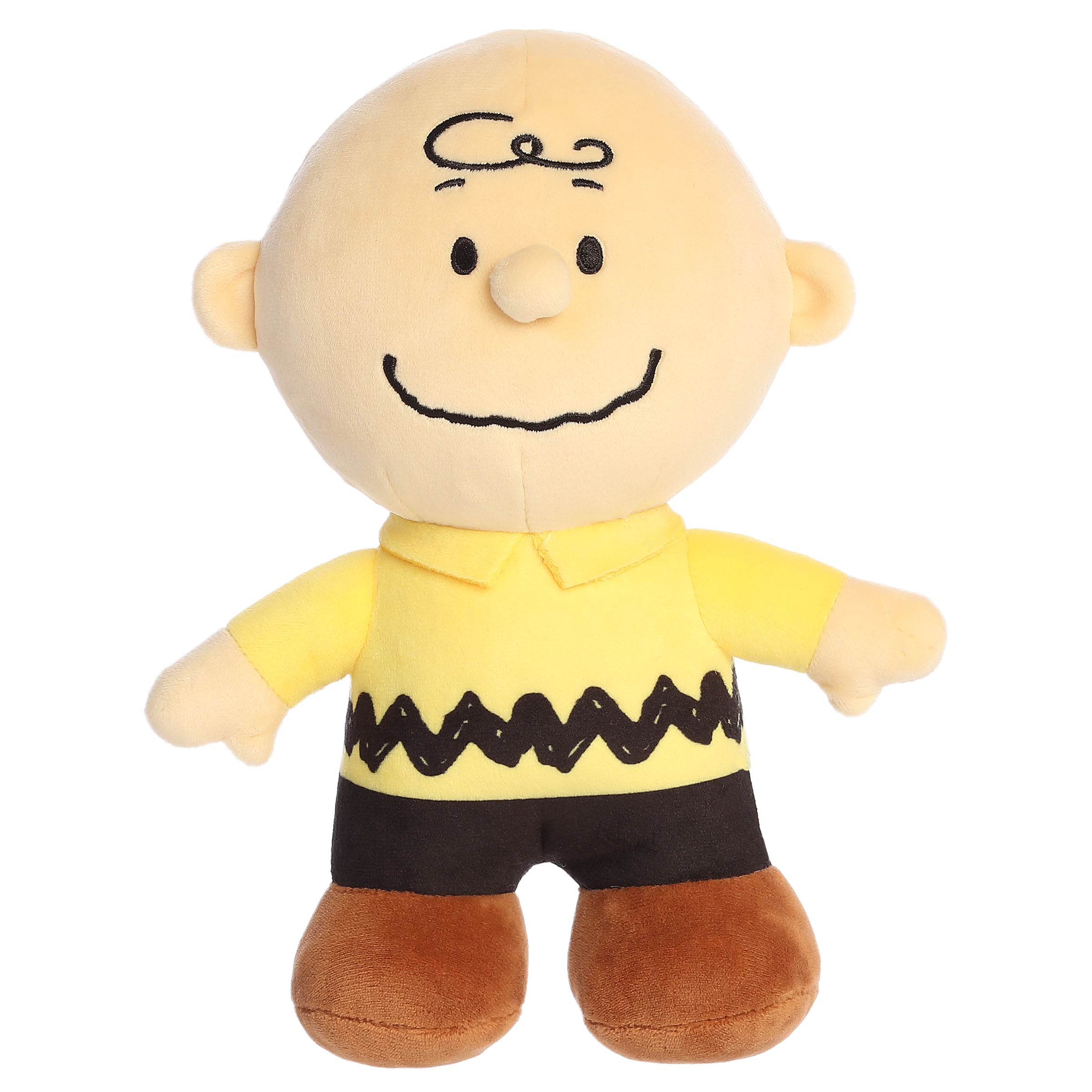 A Charlie Brown plush toy from Aurora with his yellow shirt and beans in his feet.