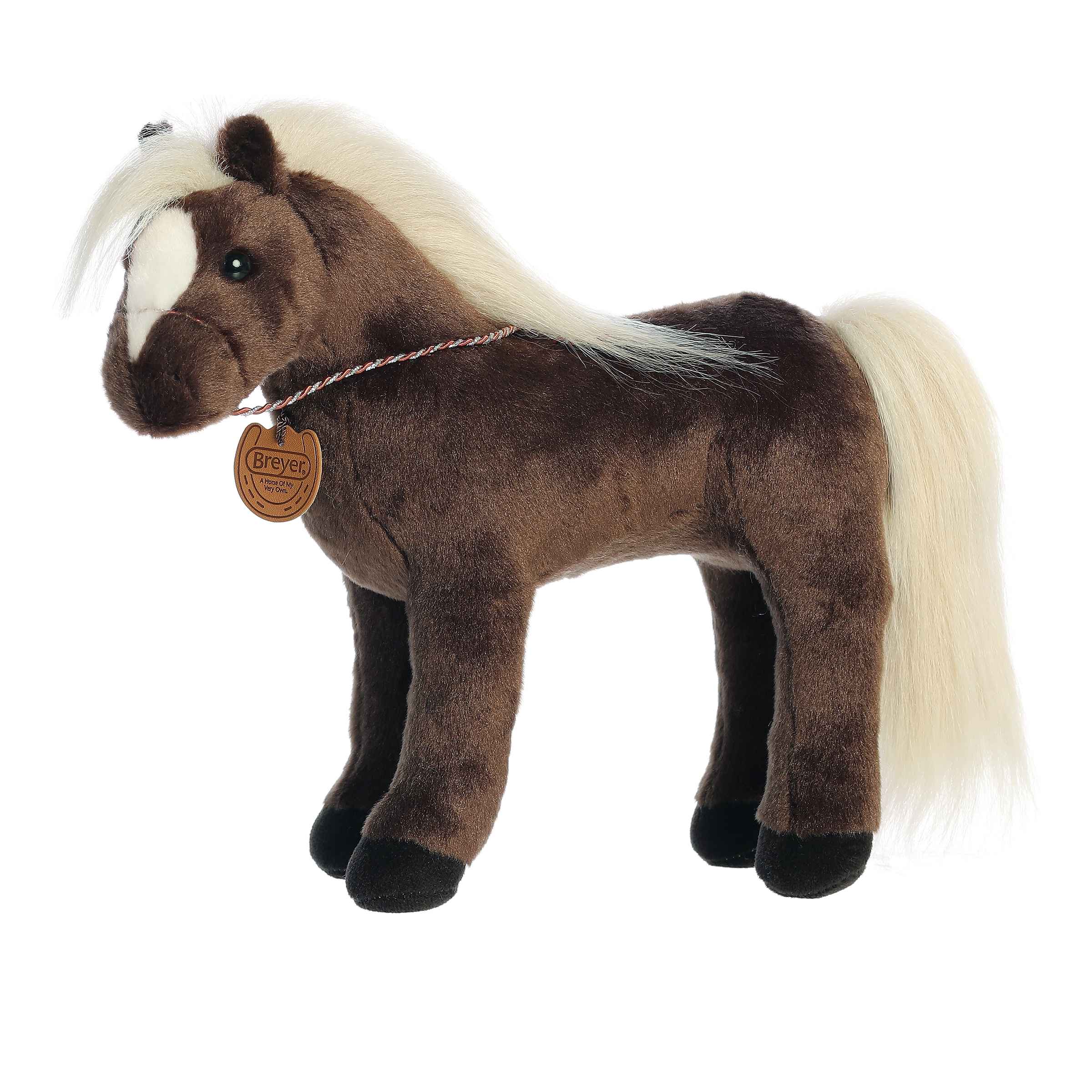 Plush toy of Showstoppers Black Forest Horse from the Breyer collection with a brown coat and soft cream mane and tail.