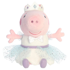 A Peppa Pig plush toy from Aurora wearing a princess outfit.