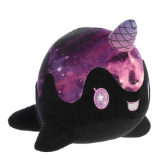 Space Nomwhal plush from Tasty Peach, galaxy fabric, snuggly design, perfect for lovers of cosmic charm and kawaii culture