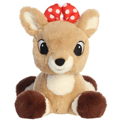 A Clarice plush toy from Aurora with a red bow, gentle expression, and a laying pose.
