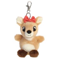 A Clarice plush clip-on from Aurora with a tan-and-cream body, red bow, tiny antlers, and embroidered features.