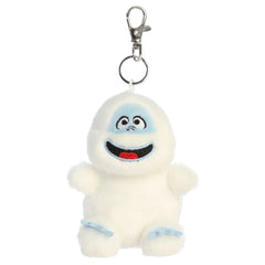 A Bumble plush clip-on from Aurora with a white body, blue accents, and a friendly smile.