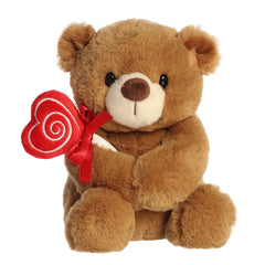 8-inch teddy bear clutching heart-shaped lollipop, ideal for Valentine's sweetness.