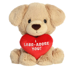 Labrador plush holding a heart with 'I LABR-ADORE YOU', perfect for playful Valentine's gifting.