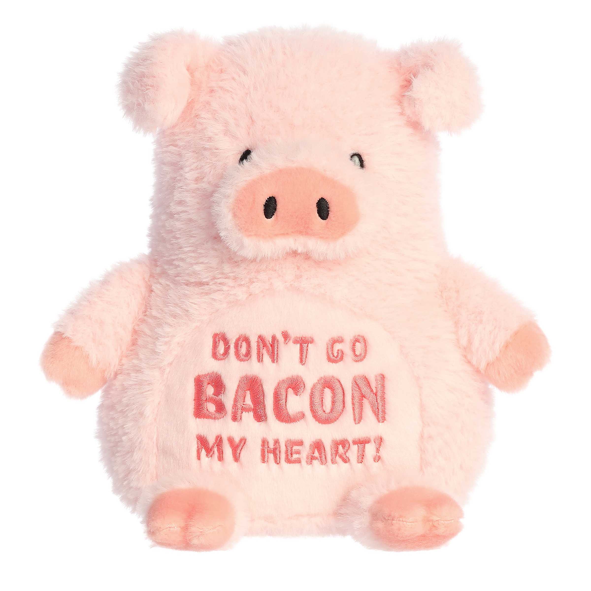 Pink pig plush with 'Don't Go Bacon My Heart' pun, ideal for a humorous Valentine's gift.