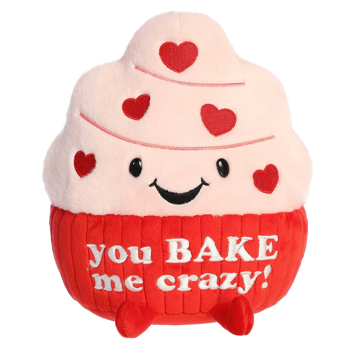 Cupcake plush with red hearts and 'You Bake Me Crazy' pun, perfect for Valentine's warmth and whimsy