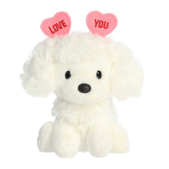 White poodle plush with pink heart ears, perfect for expressing love on Valentine's Day.