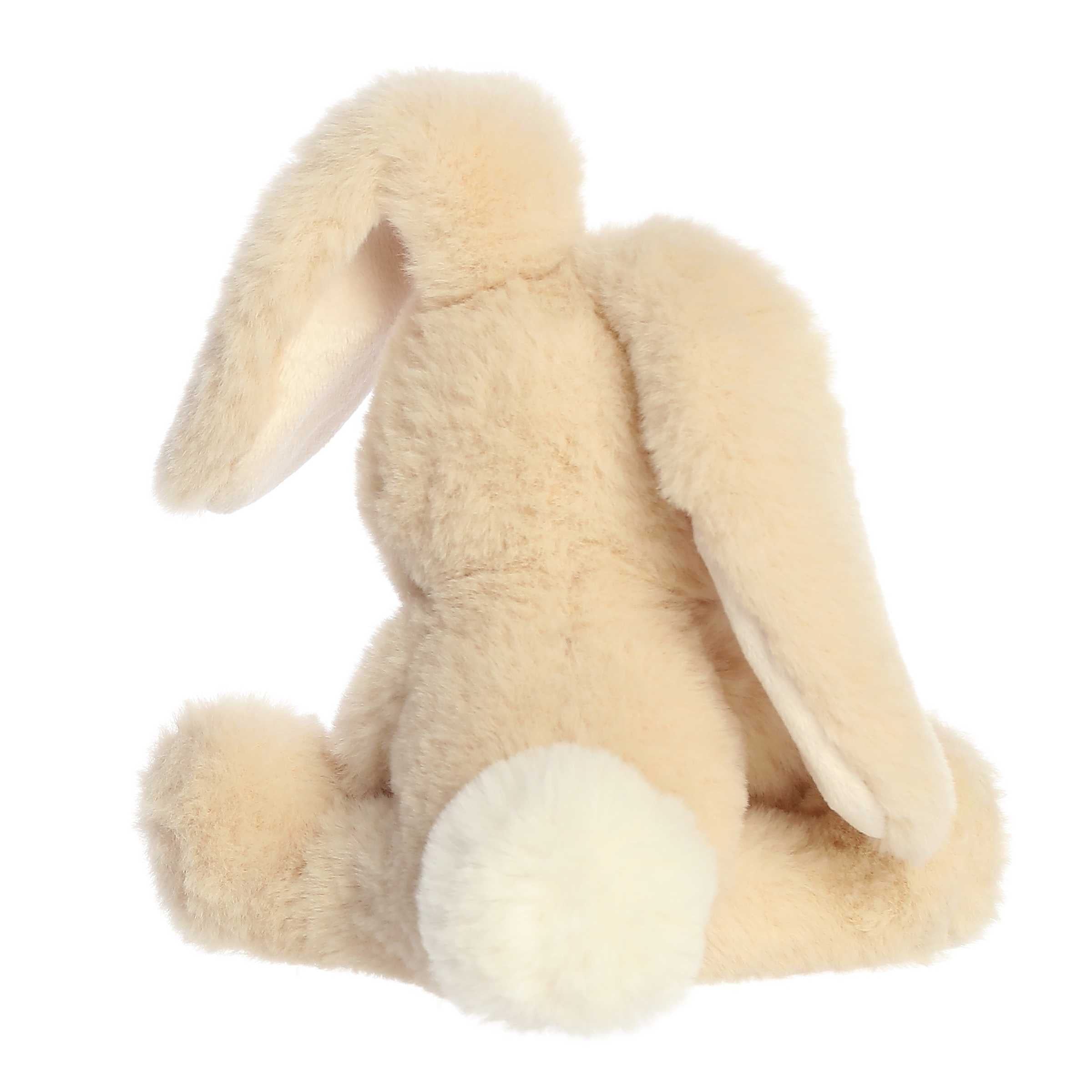 A plush bunny with a chocolate brown colored coat of fur with one ear up and one ear down