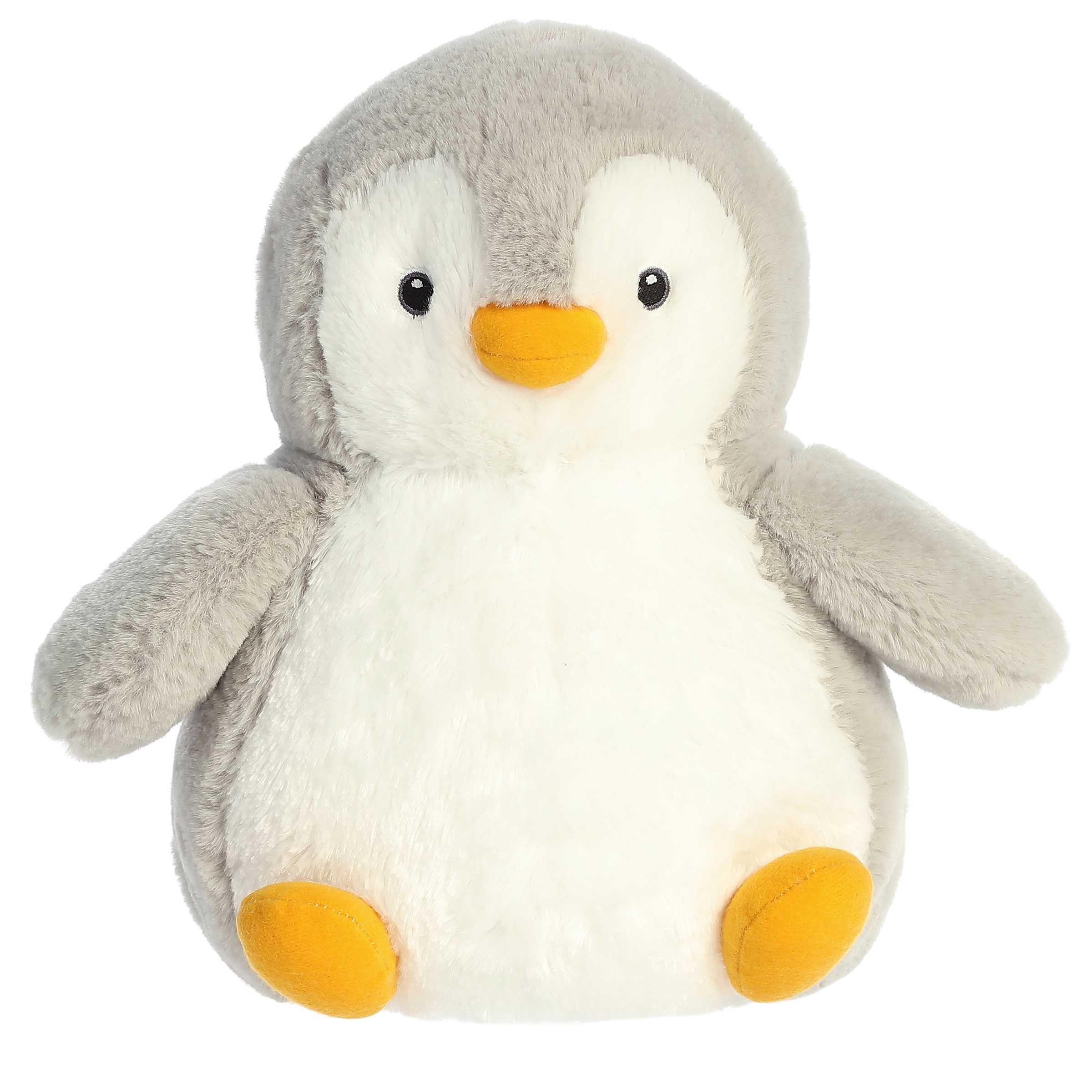 Fluffy gray Penguin plushie with tiny yellow feet, embroidered eyes, and a sunny bill, in the Destination Nation collection.