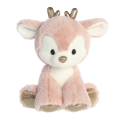 Adorable pink reindeer plush toy in a sitting position and gold accents on the tiny horns and feet pads