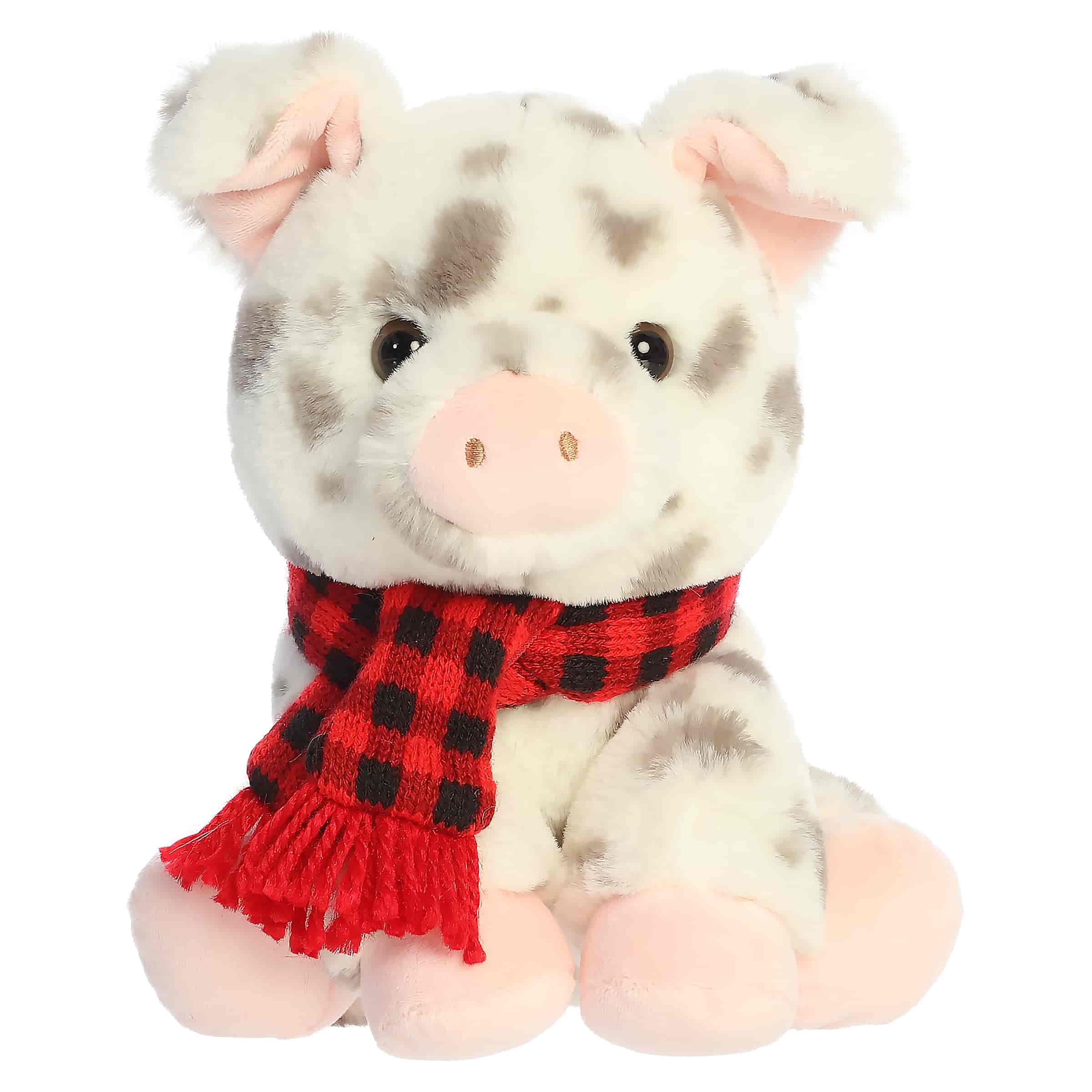 White spotted pig plush wearing a red plaid scarf