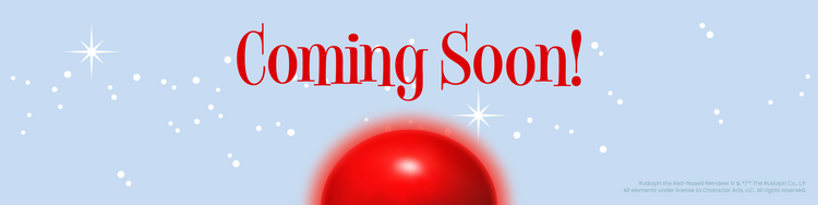Red text reading "Coming Soon!" above a glowing red nose on a light blue background with white sparkles.