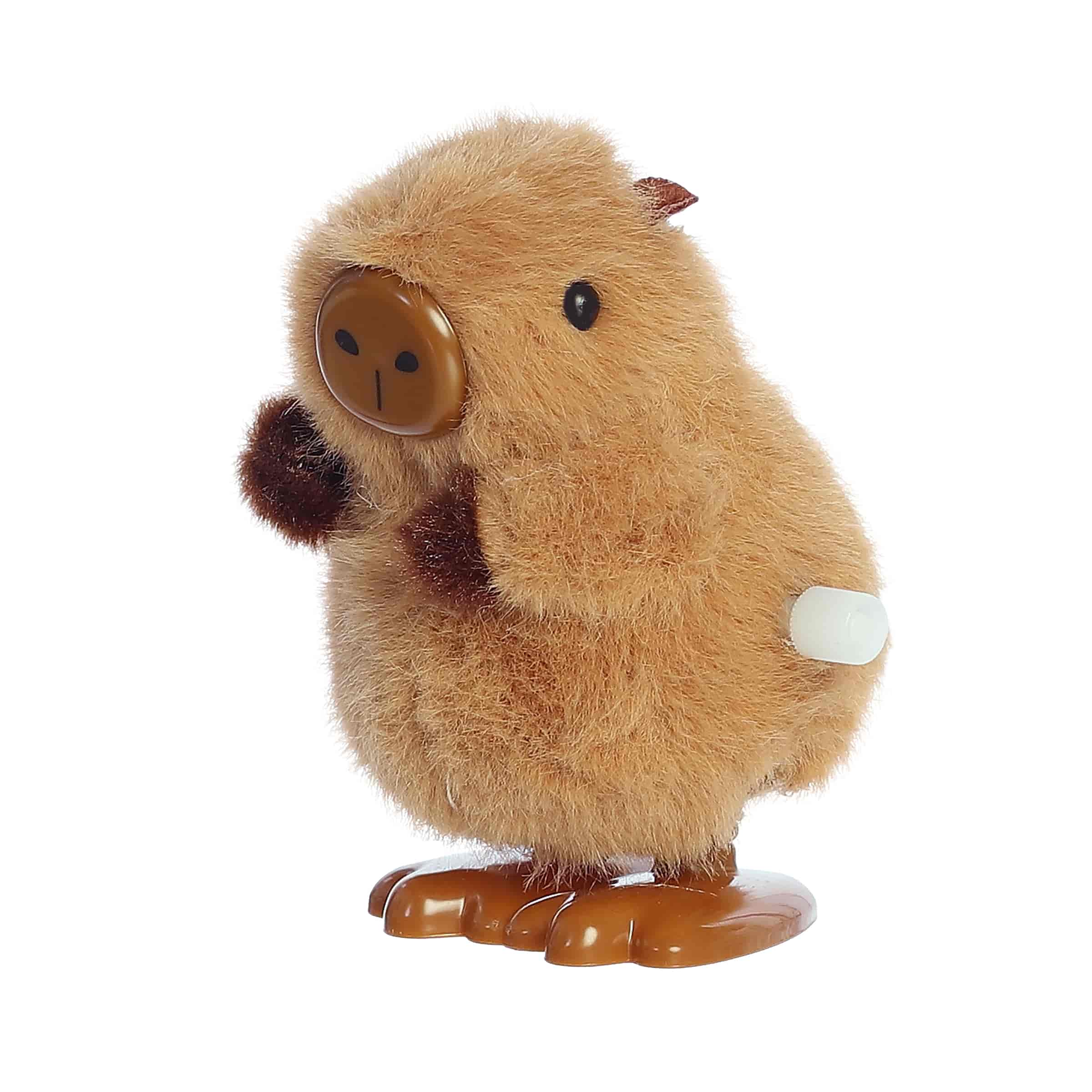 A Wind Up Capybara toy by Aurora Toys featuring fuzzy fur and a wind-up key for waddling movement.