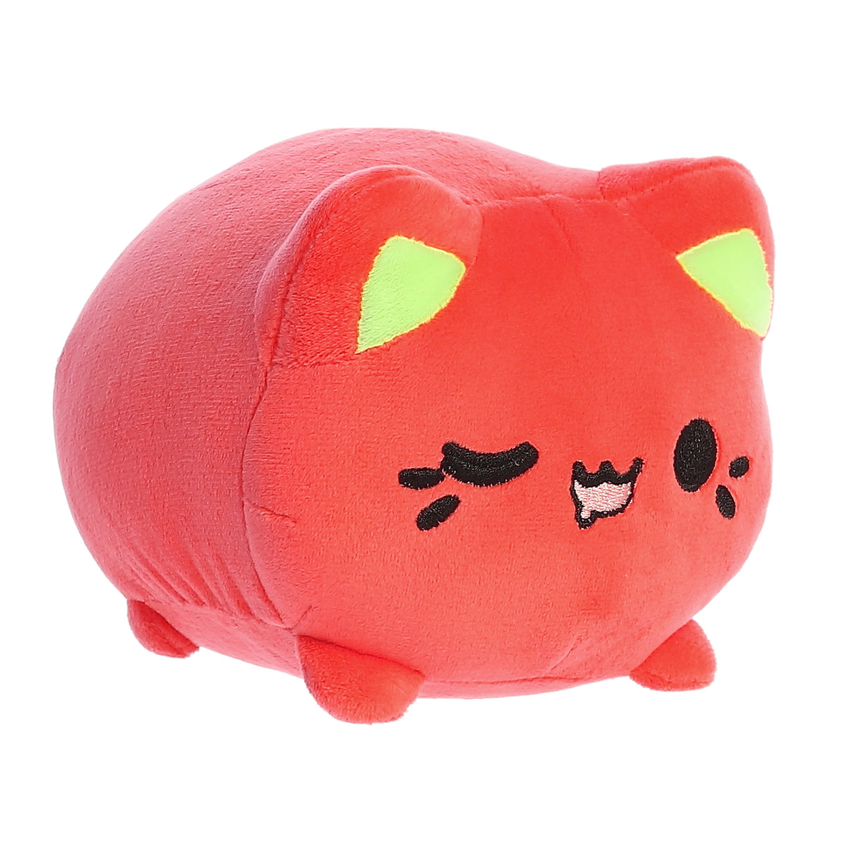 A red Tasty Peach Meowchi plush that is a round cylinder shape with the resemblance of an animated winking cat.