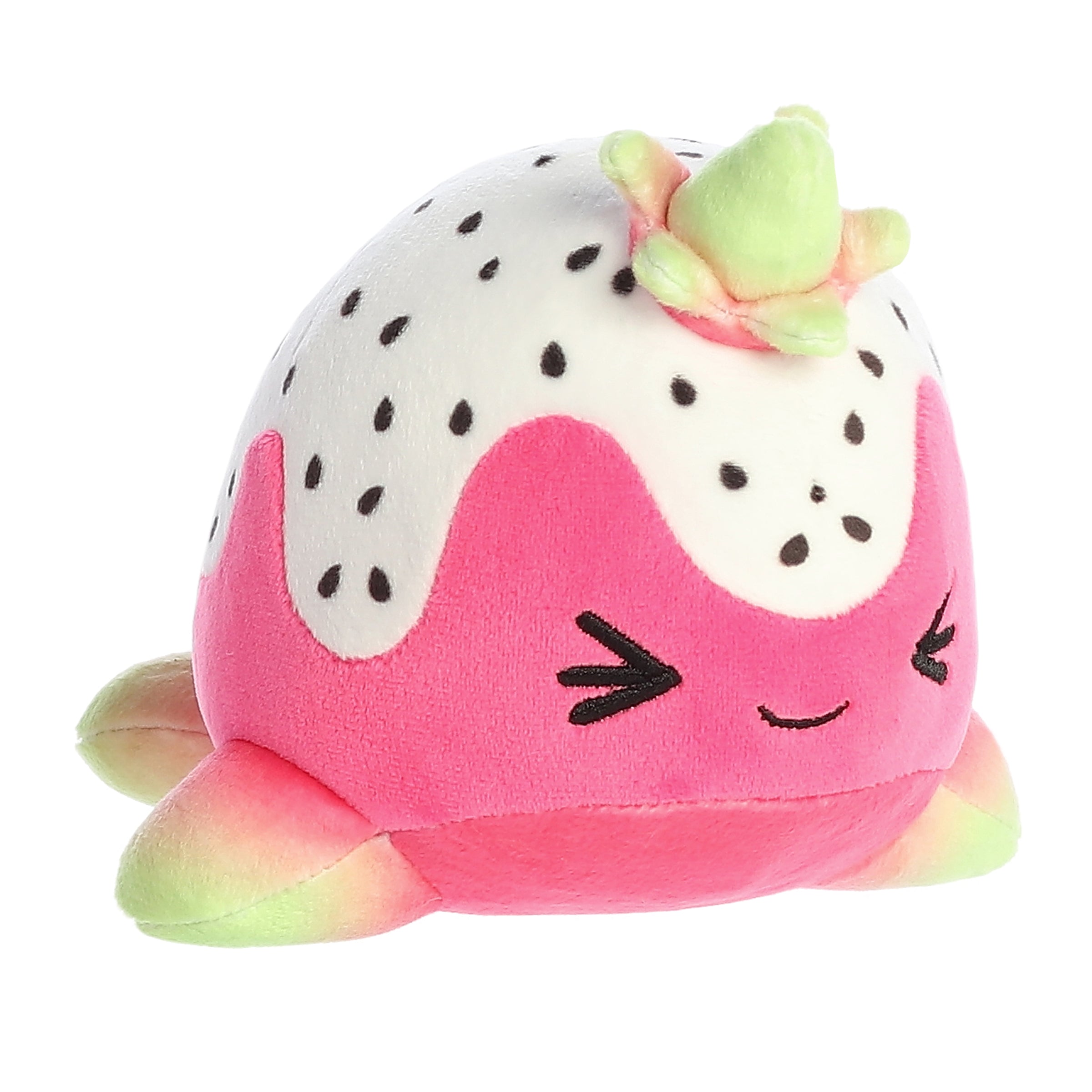 A pink and white Tasty Peach Nomwhal plush that is an expressive narwhal with the color scheme of a dragonfruit