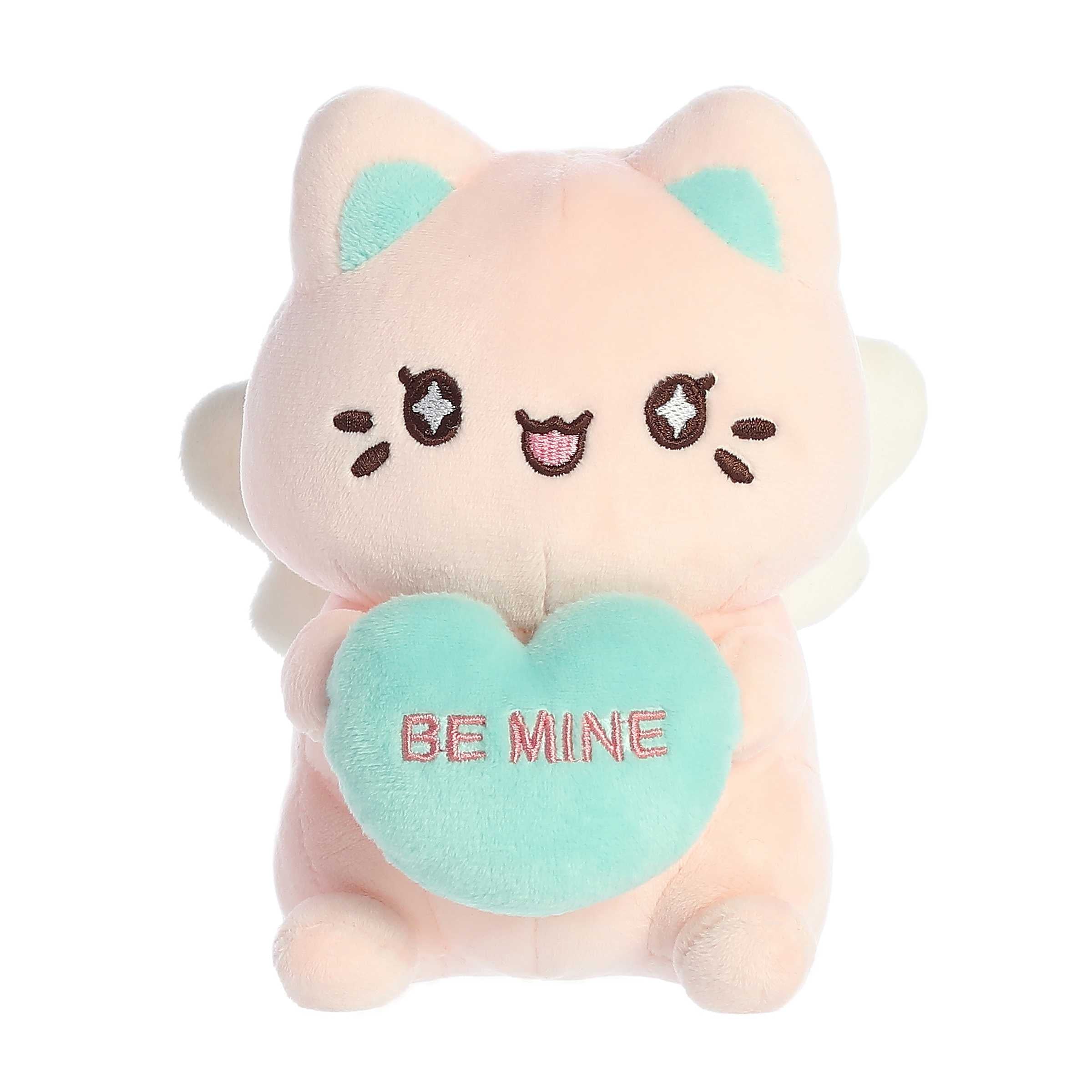 Pink Candy Heart Sitting Mewochi with angel wings holding "Be Mine" candy heart, from Tasty Peach Valentine plush collection