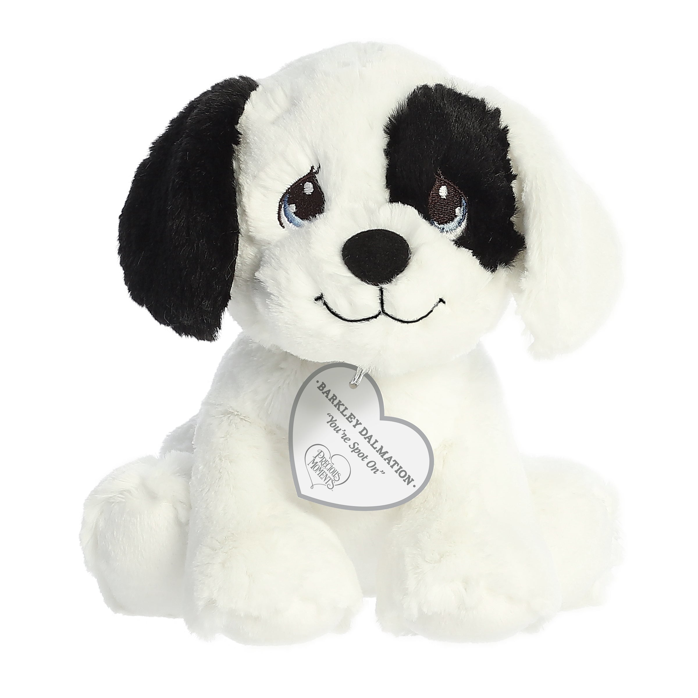 A sitting-down dalmation dog plush with tear-drop eyes and a precious moments inspirational tag around its neck.