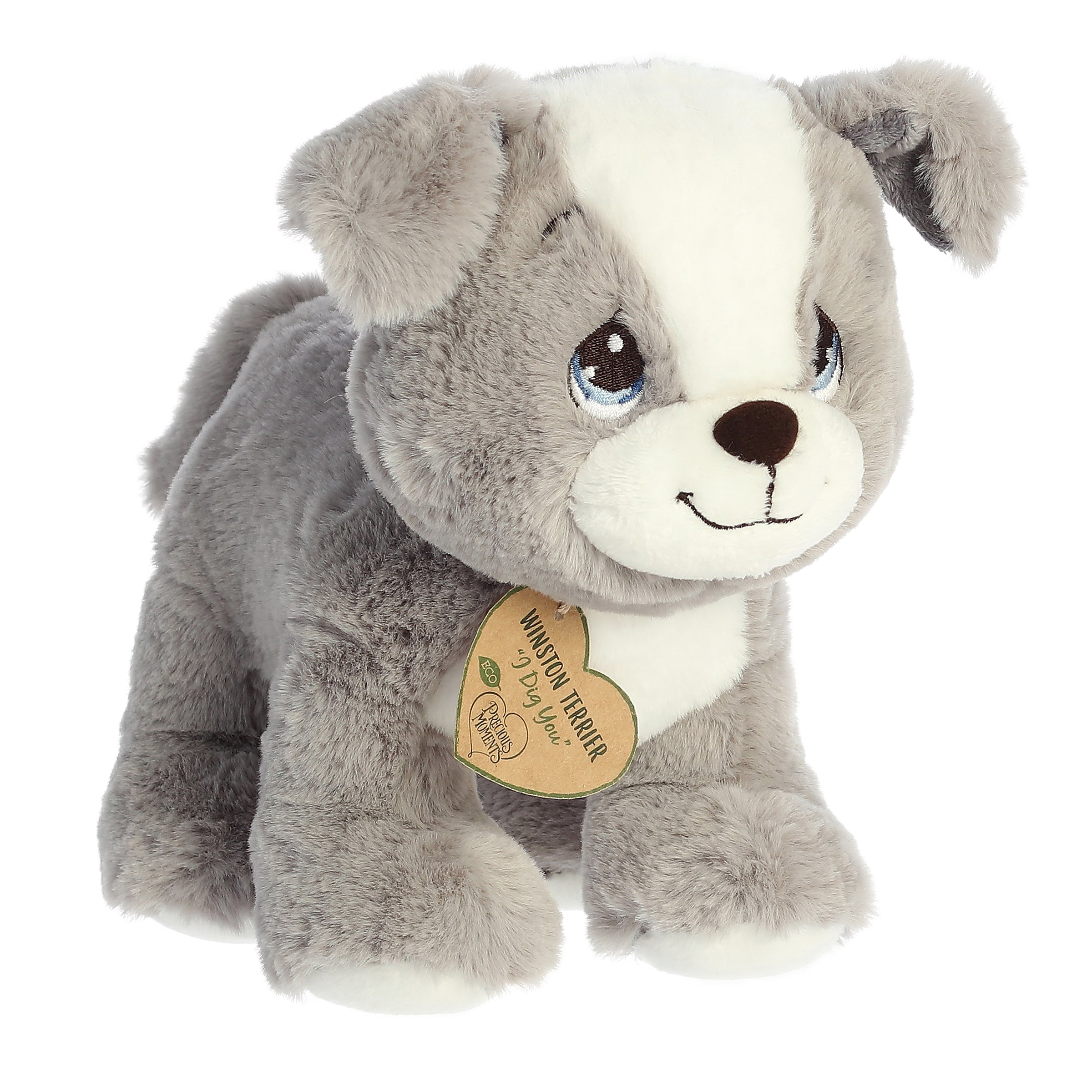 An eco-friendly gray and white terrier dog plush with tear-drop eyes and a precious moments inspirational tag on its neck.