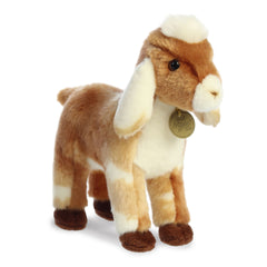 Miyoni Nubian Goat Kid Plush with tan and white fur, floppy ears, gentle gaze, eco-friendly, embodies country charm.