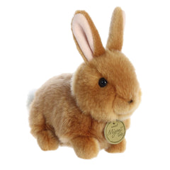 Silky-furred Baby Bunny plush with lifelike ginger fur features, crafted to captivate with long rabbit ears, by Aurora.