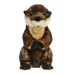 Realistic river otter plush with bright eyes and soft, patterned fur, crafted for an authentic feel, by Aurora.