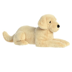 A large golden-furred plush pup with floppy ears from Aurora's Super Flopsie collection, in a resting pose.