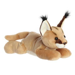 Soft Flopsie Caracal plush, tan fur and fluffy ears, with a lifelike wild feline charm.