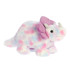 A colorful Triceratops Tyrian dino plushie, blending purple, pink, and blue, inviting vibrant adventures and cuddles.