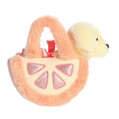 Adorable plushie pup in a zesty pastel orange grapefruit carrier by Aurora with fuzzy straps, spreading fruity fun vibes.