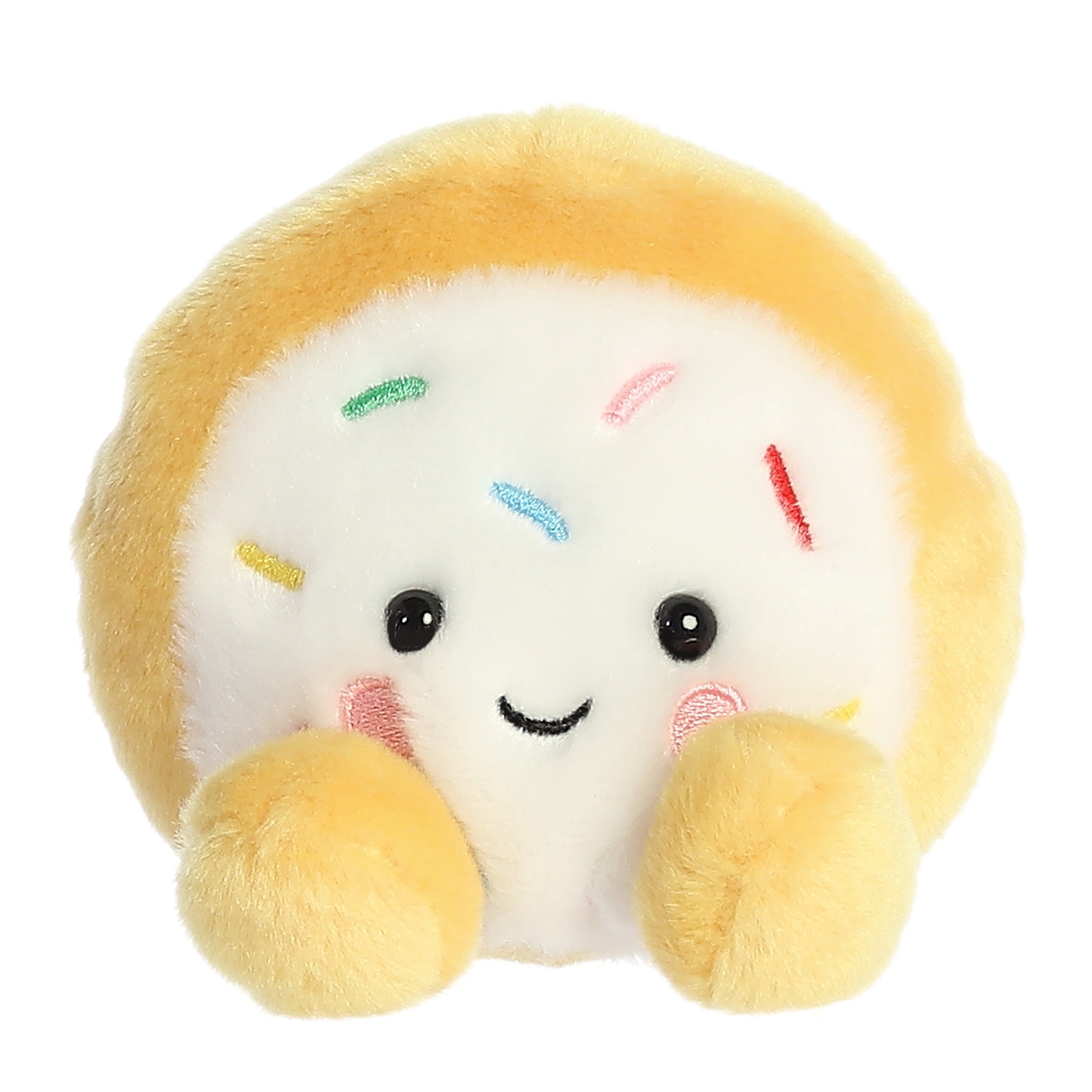 Cookie plush from Palm Pals, showcasing a vibrant yellow base and frosting design, enticingly ready for playful snuggles.